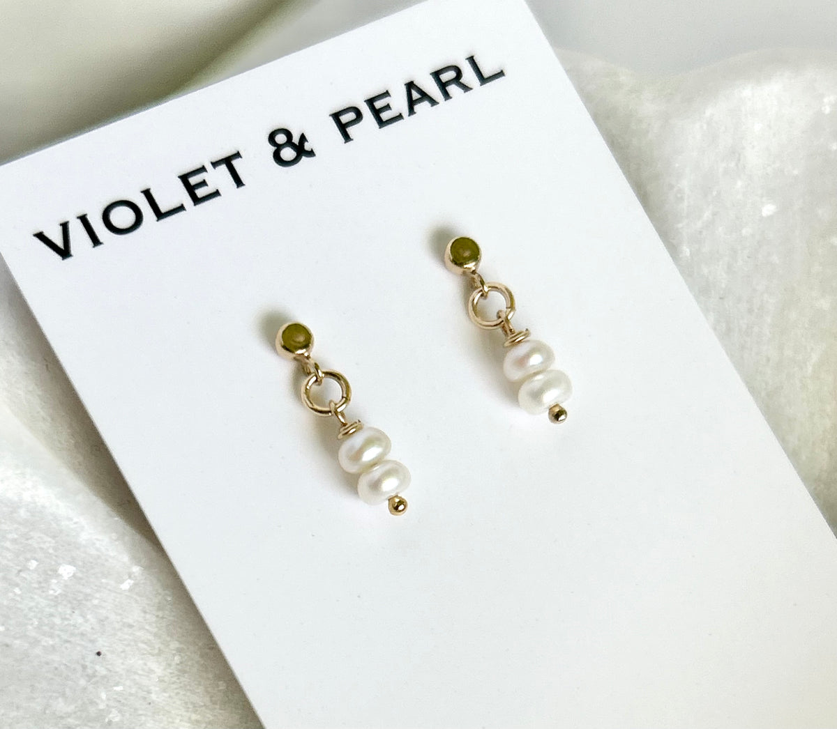 Tiny pearl studs