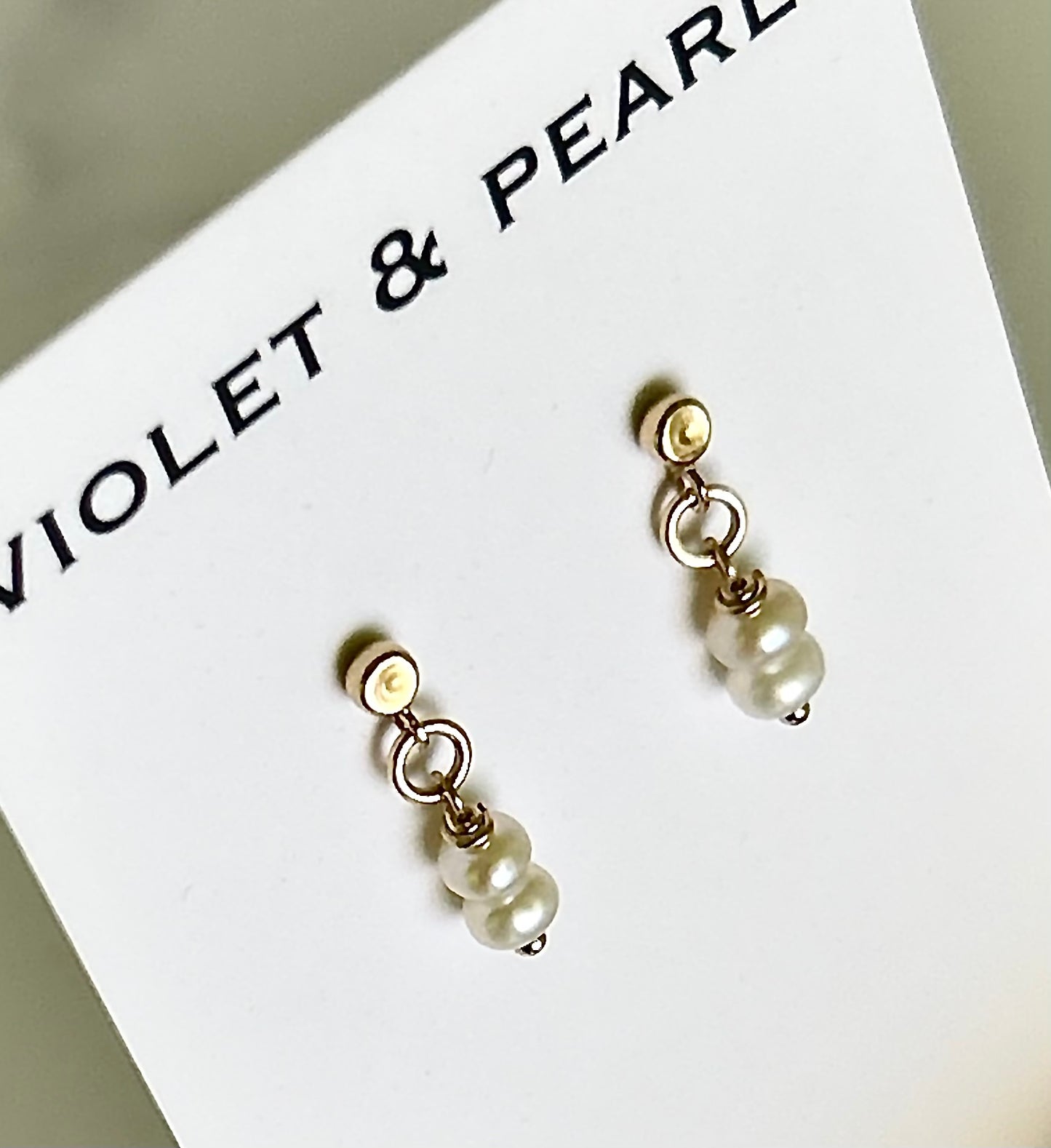 Tiny pearl studs